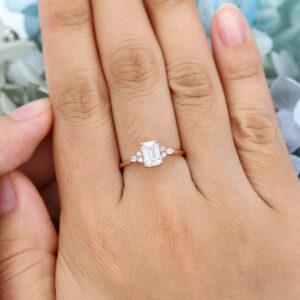 AMANDAFINEJEWELRY Moissanite Emerald Cut Rose Gold Engagement Ring (6)