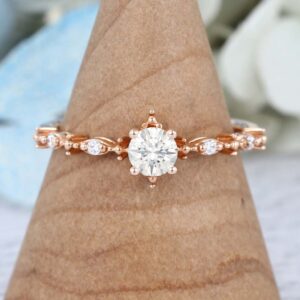 Unique Round Cut Rose Gold Moissanite Engagement Ring
