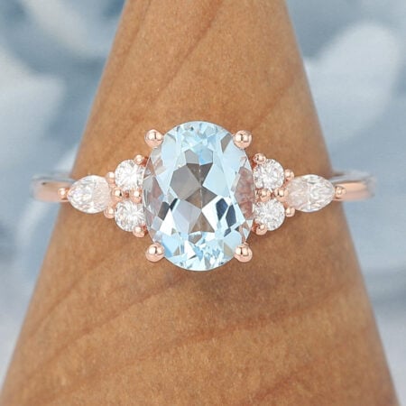 Delicate Rose Gold Cluster Oval Aquamarine Engagement Ring