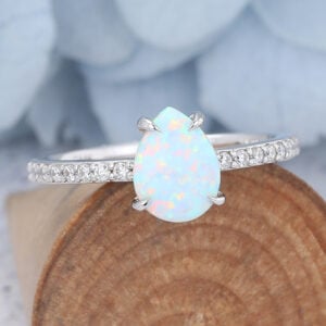 Moonstone vs Opal non diamond engagement rings 14K White Gold Pear Shaped Opal Halo Engagement Ring