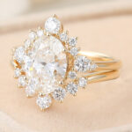 Oval Cut Lab Grown Diamond Half Halo Engagement Ring Set with Curved Wedding Band