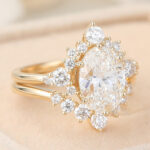 Oval Cut Lab Grown Diamond Half Halo Engagement Ring Set with Curved Wedding Band