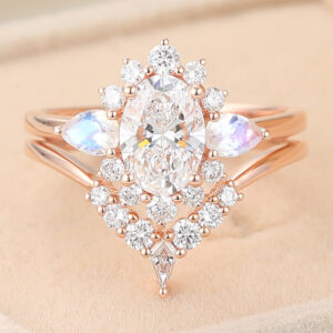 Dua Lipa Engagement Ring jewelry trends in 2025 Oval Cut Lab Grown Diamond Cluster Halo Bridal Set with Moonstone Accents