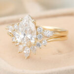 Aries Birthstone Pear Cut Lab Grown Diamond Cluster Engagement Ring Set with Curved Wedding Band