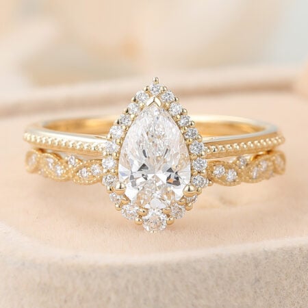 what knee do you propose on Pear Cut Lab Grown Diamond Halo Engagement Ring Set with Straight Wedding Band