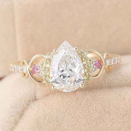 Does 14k Gold Tarnish April Birthstone Pear Cut Lab Grown Diamond Infinity Engagement Ring with Pink Sapphire and Peridot Accents