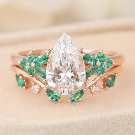 Simulated Diamond 1 carat vs 2 carat Pear Cut Lab Grown Diamond Nature-Inspired Bridal Ring Set with Emerald Accents