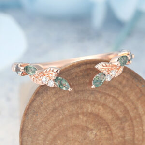 The nature inspired open band features moss agate, alexandrite and moissanite stones sets on the cuved rose gold opan band, unique and simple.