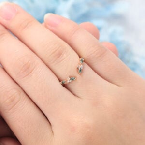 The nature inspired open band features moss agate, alexandrite and moissanite stones sets on the cuved rose gold opan band, unique and simple.