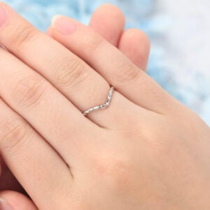 The gold curved twisted wedding band features twisted white gold band with no gemstones, which is a simple stacking ring for women.