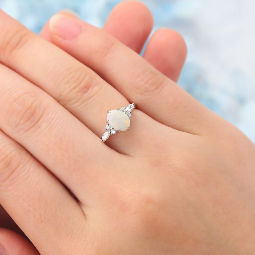 Oval Cut Opal Engagement Ring Twisted Band in White Gold