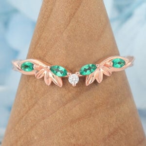 Twist Curved Wedding Band with Emerald & Diamond Accents