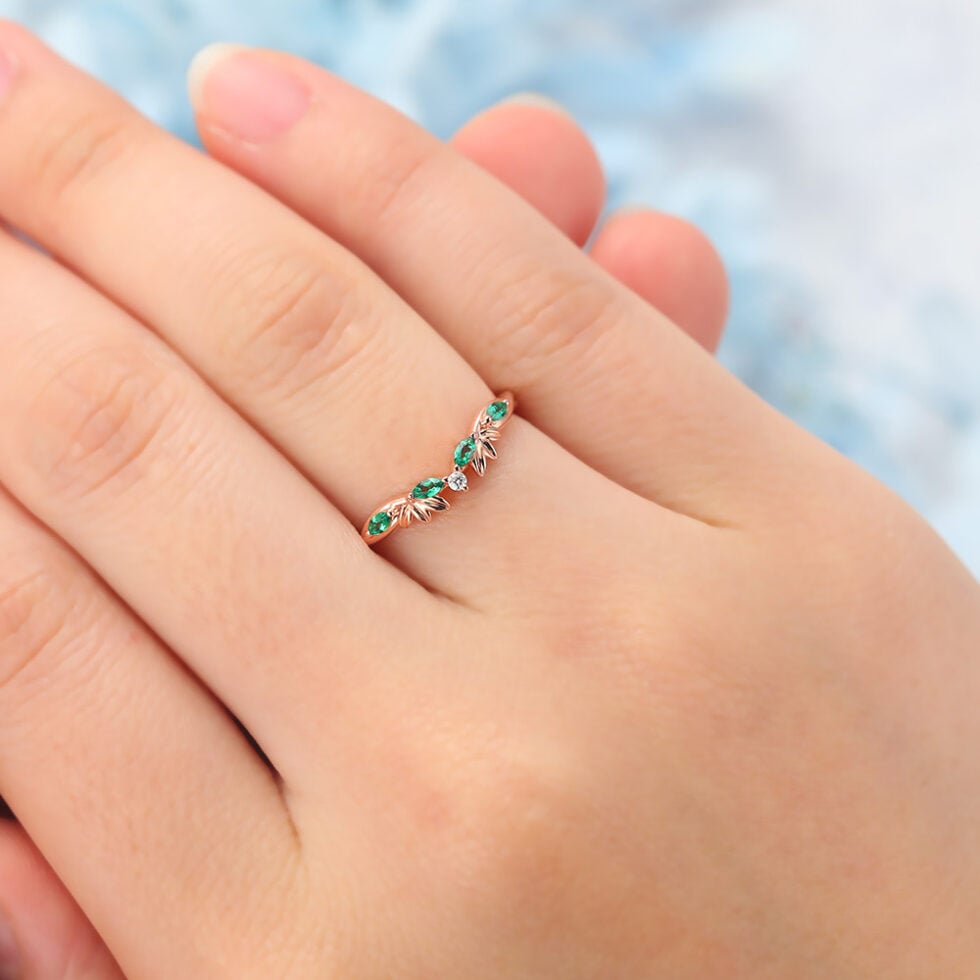 Twist Curved Wedding Band with Emerald & Diamond Accents