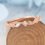 What Is a Promise Ring Nature-Inspired Curved Wedding Band Floral Vine with Moissanite Sparkle