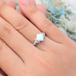 Princess Cut Opal Ring White Gold Infinity Bridal Ring features a large opal center stone and white gold band, unique and elegant.