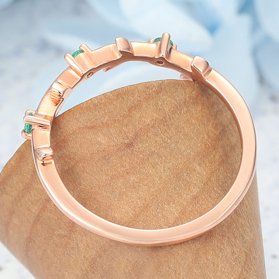 Vine-Inspired Curved Wedding Band with Emerald Accents