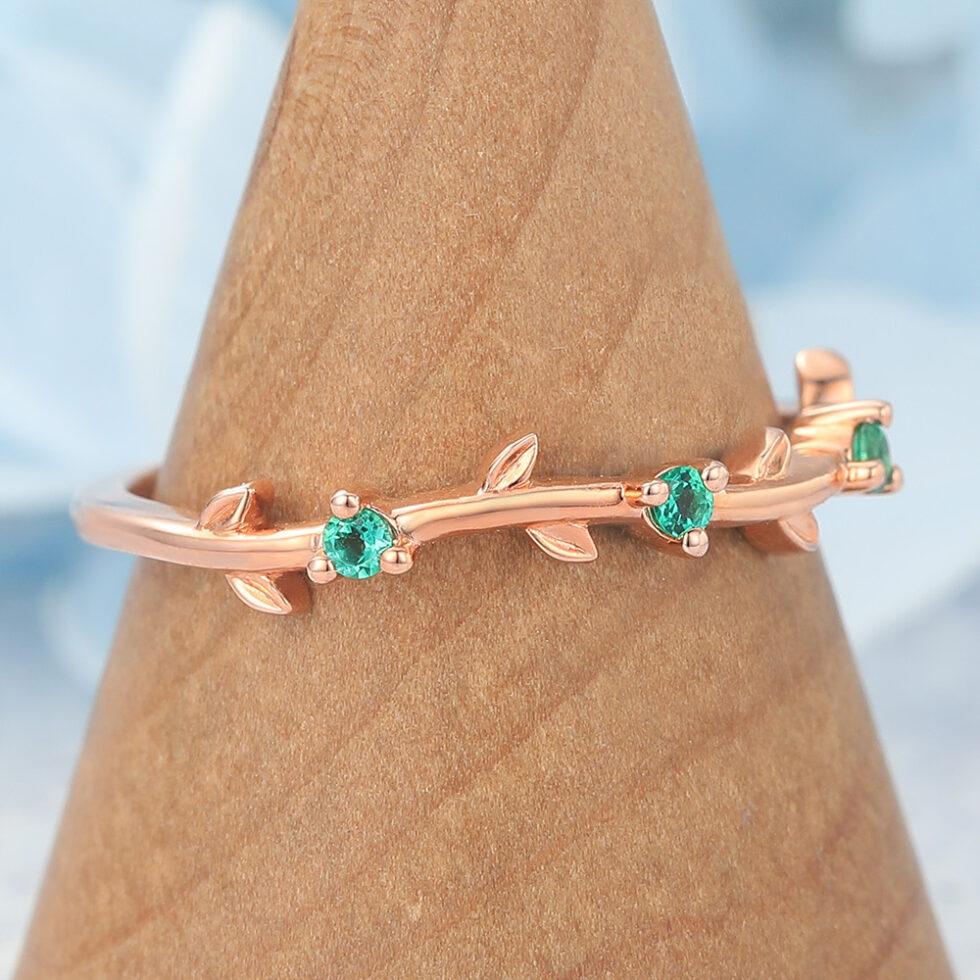 Vine-Inspired Curved Wedding Band with Emerald Accents