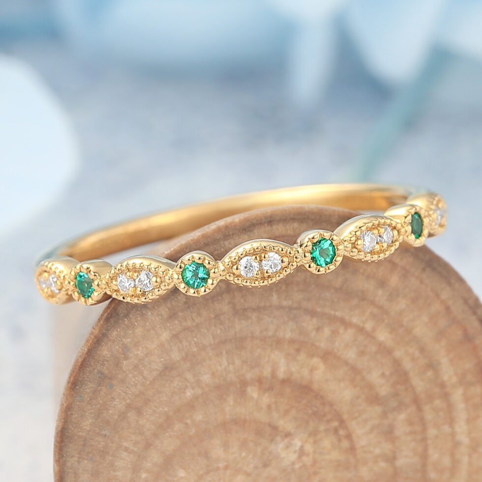 what finger does a wedding ring go on Wedding Rings Under $500 Alternating Emerald & Moissanite Half Eternity Wedding Band