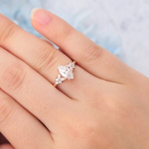 Matte Finish Marquise Cut Moissanite Engagement Ring with Floral Accent