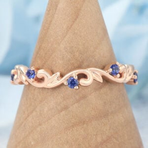 Nature-Inspired Curved Wedding Band with Sapphire Accents
