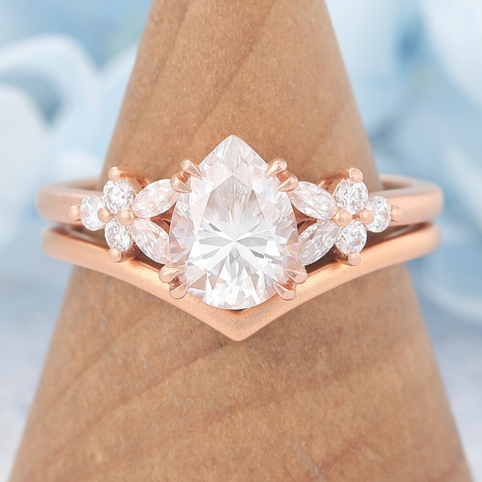 Matte Finish Pear Cut Moissanite Engagement Ring Set with Floral Accent