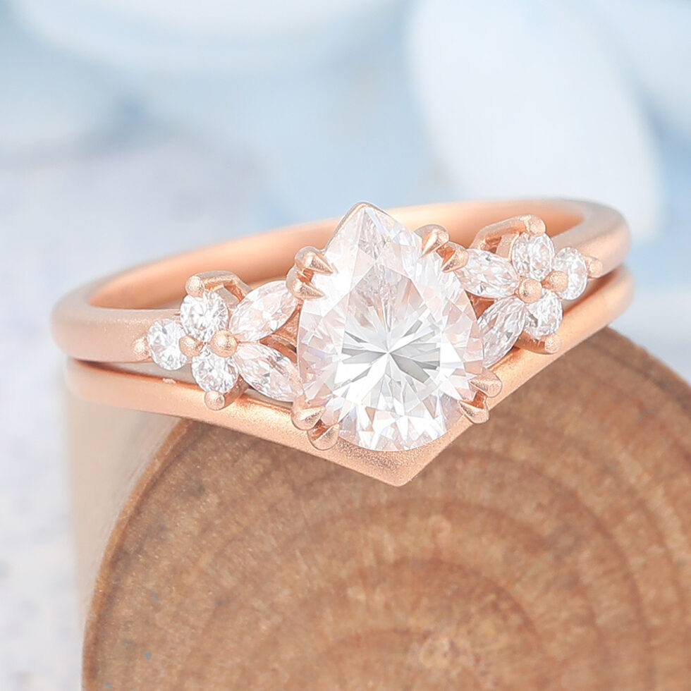 Matte Finish Pear Cut Moissanite Engagement Ring Set with Floral Accent