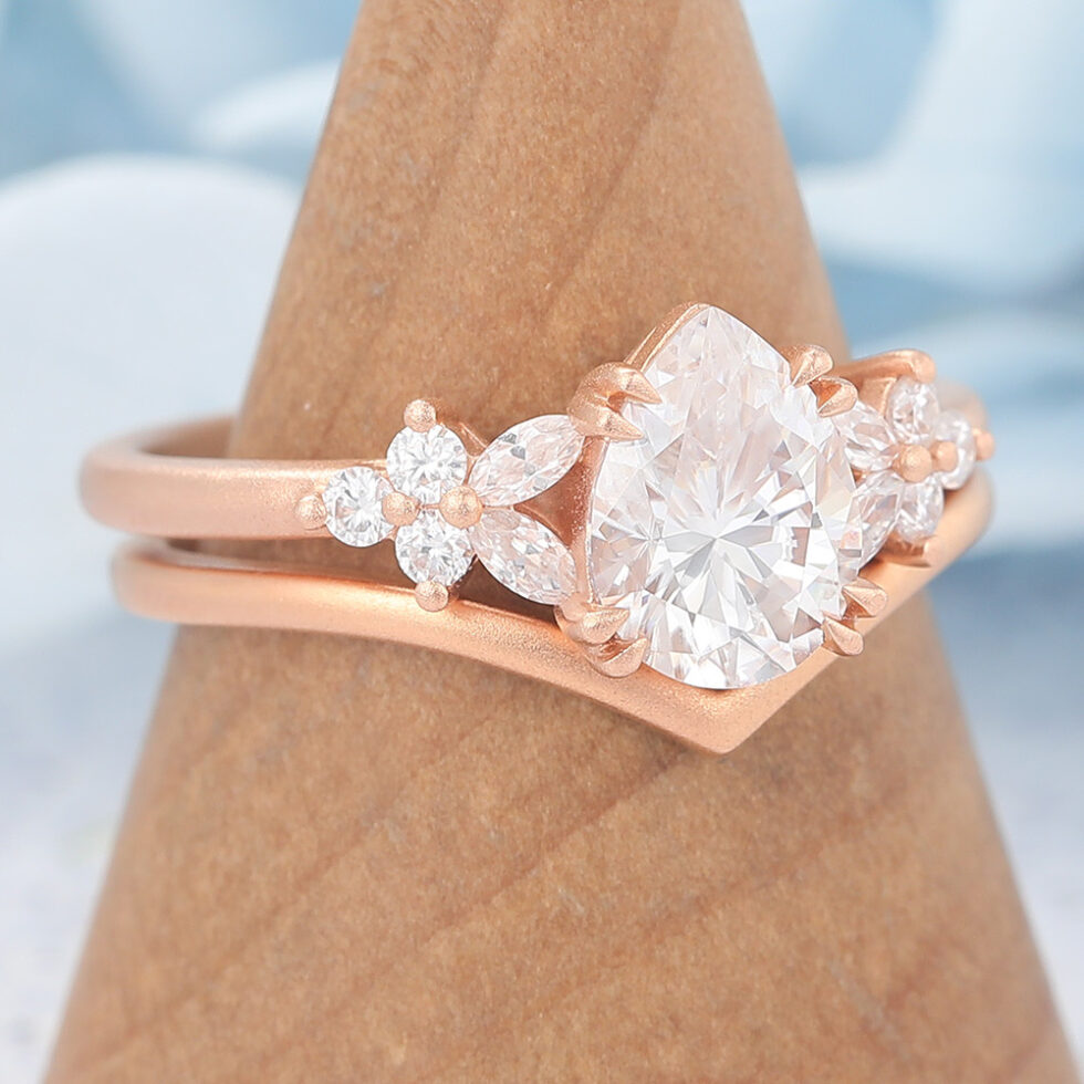 Matte Finish Pear Cut Moissanite Engagement Ring Set with Floral Accent