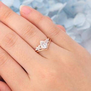 Matte Finish Pear Cut Moissanite Engagement Ring Set with Floral Accent