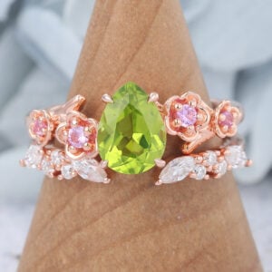 Pear Cut Peridot Nature-Inspired Bridal Ring Set with Pink Sapphire Accents