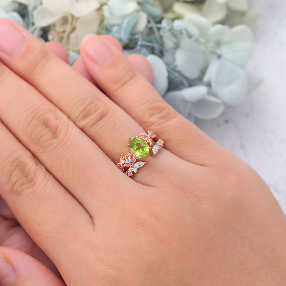 Pear Cut Peridot Nature-Inspired Bridal Ring Set with Pink Sapphire Accents