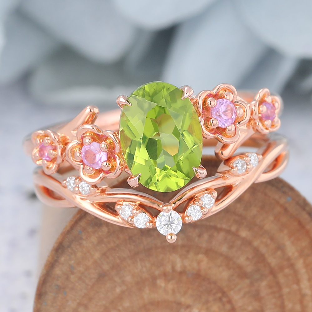 Rose Gold Oval Cut Peridot Nature-Inspired Bridal Ring Set (2) Rose Gold Oval Cut Peridot Nature-Inspired Bridal Ring Set (2)
