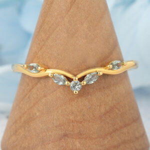 Natural-Inspired Curved Wedding Band with Green Sapphire Accents