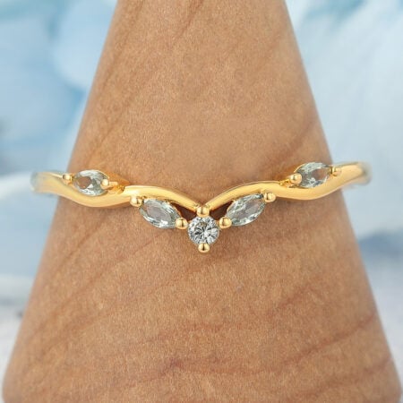 Natural-Inspired Curved Wedding Band with Green Sapphire Accents