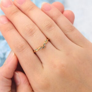 Natural-Inspired Curved Wedding Band with Green Sapphire Accents