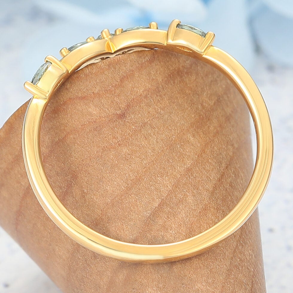 Natural-Inspired Curved Wedding Band with Green Sapphire Accents