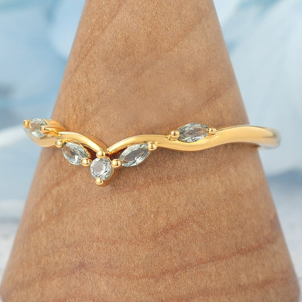 Natural-Inspired Curved Wedding Band with Green Sapphire Accents