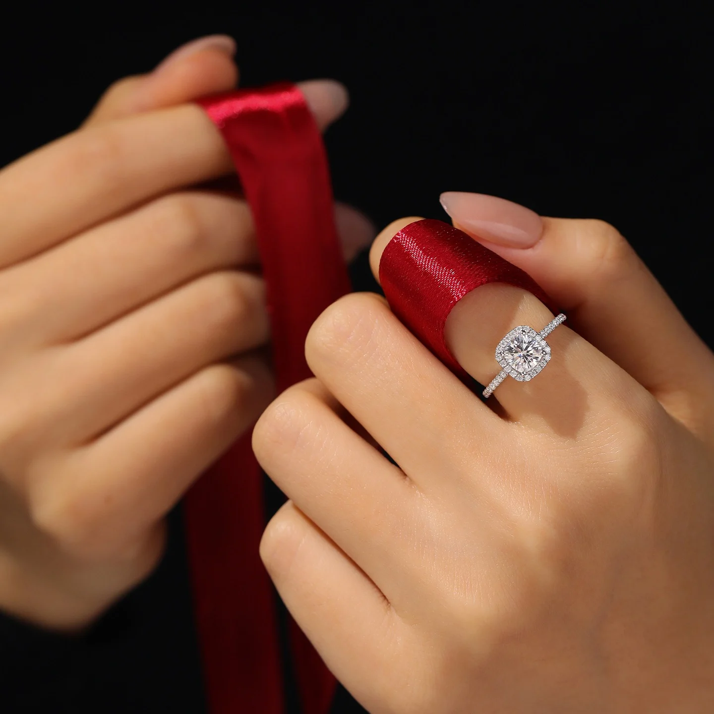 Starlight Halo engagement ring with radiant center gemstone surrounded by a shimmering halo of diamonds, creating a breathtaking star-like effect